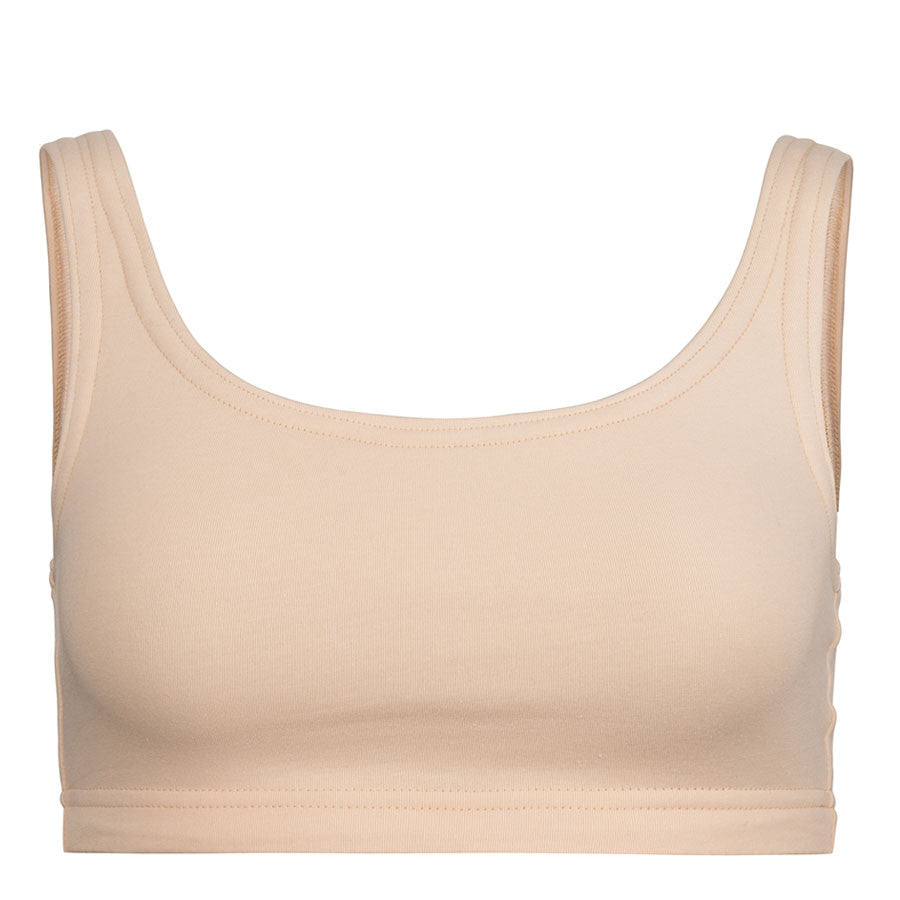 Minimal Bounce Bra in Flesh colour double layered compression fabric using a unique blend of Cotton/Poly/Lycra for a soft and luxurious feel Designed for even pressure distribution with smooth reversed seams which dramatically increase comfort
levels Supreme support of breasts’ Coopers Ligaments to reduce irreversible stretch and damage
Zero metal components associated with damage during prolonged impact movement This product is highly recommended during the recovery period after breast surgery