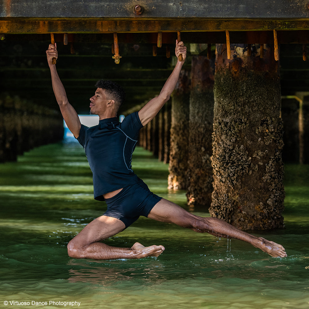 Jazz Gritt wearing Brandon Lawrence by dansez black top and shorts using Econyl fabrics