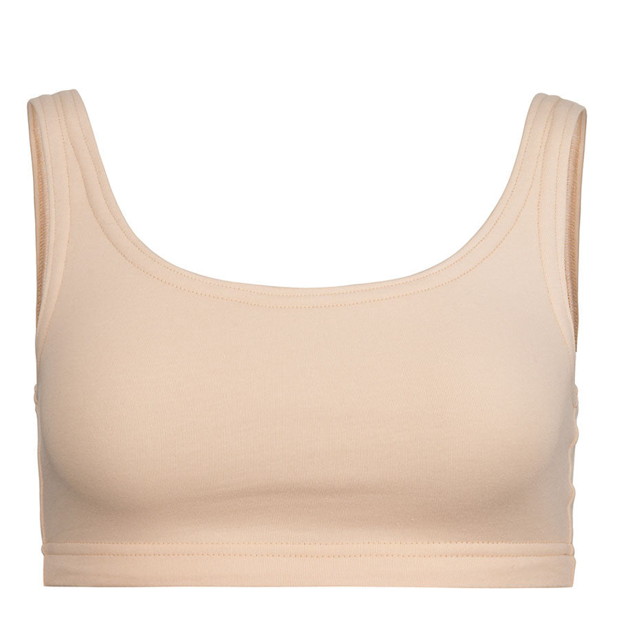 Minimal Bounce Bra in Flesh colour double layered compression fabric using a unique blend of Cotton/Poly/Lycra for a soft and luxurious feel  Designed for even pressure distribution with smooth reversed seams which dramatically increase comfort  levels  Supreme support of breasts’ Coopers Ligaments to reduce irreversible stretch and damage   Zero metal components associated with damage during prolonged impact movement  This product is highly recommended during the recovery period after breast surgery