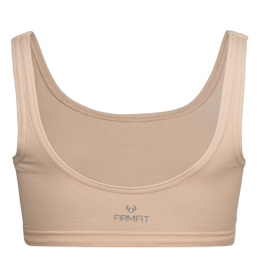 Minimal Bounce Bra in Flesh colour double layered compression fabric using a unique blend of Cotton/Poly/Lycra for a soft and luxurious feel  Designed for even pressure distribution with smooth reversed seams which dramatically increase comfort  levels  Supreme support of breasts’ Coopers Ligaments to reduce irreversible stretch and damage   Zero metal components associated with damage during prolonged impact movement  This product is highly recommended during the recovery period after breast surgery