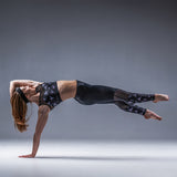 stylish and popular dance top is now available in our exclusive NEW Bee print.  Double layered front for additional support  Stunning open back design  Snug midriff band keeps the top in place   Sheer Power Mesh for cooler feel  Made with sustainable and regenerated planet friendly fabrics
