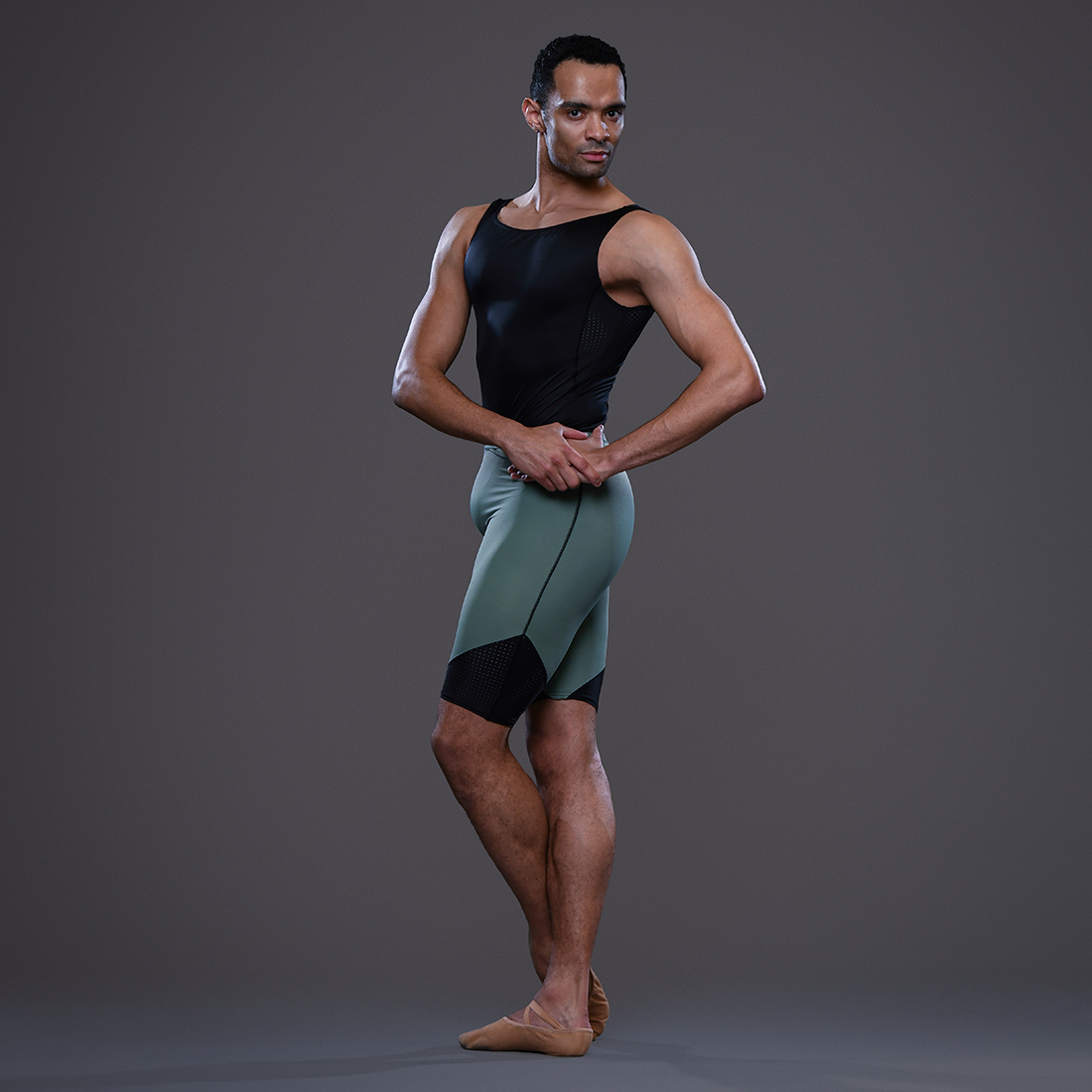 Brandon Lawrence Soloist Ballet Zurich wearing green dance shorts designed by dansez 